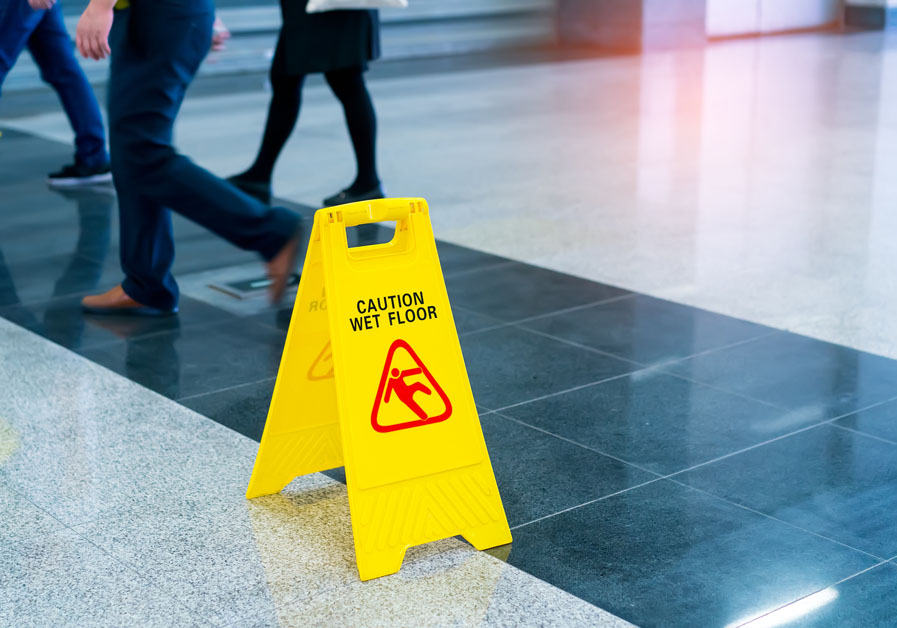 yellow sign for Caution wet floor